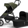 Thule " Urban Glide 2, Jogging-Buggy Mit Kinderkörbchen, Cypress Green -Babyartikelgeschäft thule urban glide 2 jogging buggy mit kinderkorbchen cypress green